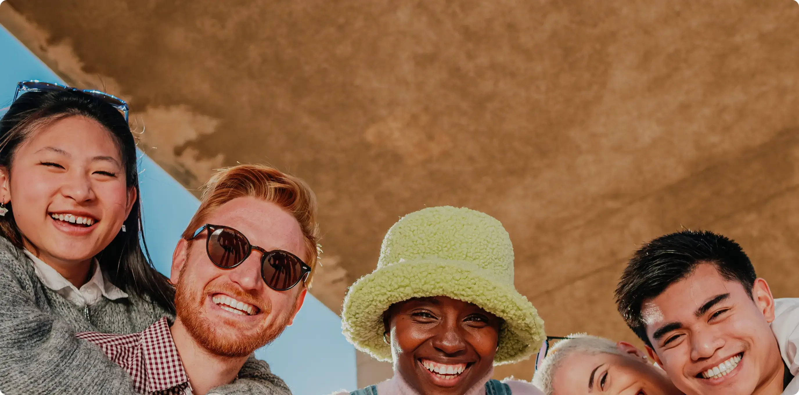 Diverse group of friends smiling and having fun together